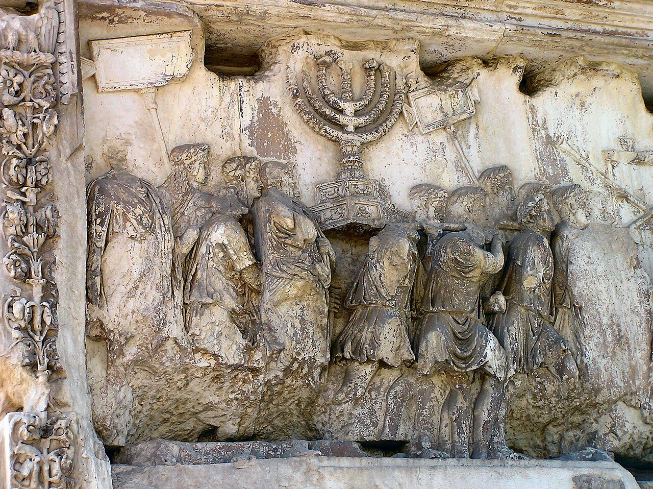 Detail of the original Arch of Titus relief in the Roman Forum