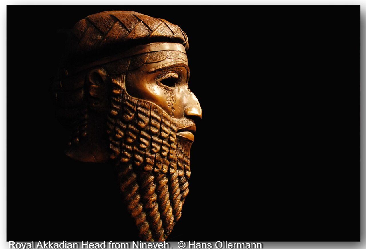 A life-size bronze head of a bearded Akkadian king, eyes now missing