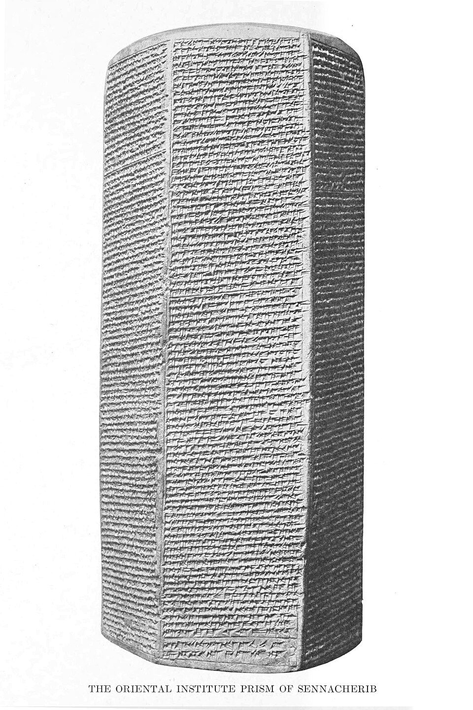 A six-sided baked-clay prism covered in cuneiform annals of Sennacherib.