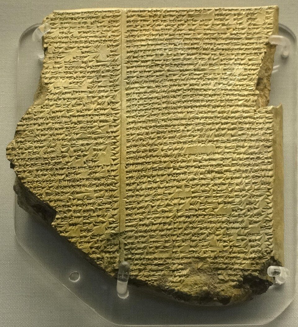 A clay cuneiform tablet inscribed with the Gilgamesh flood narrative.