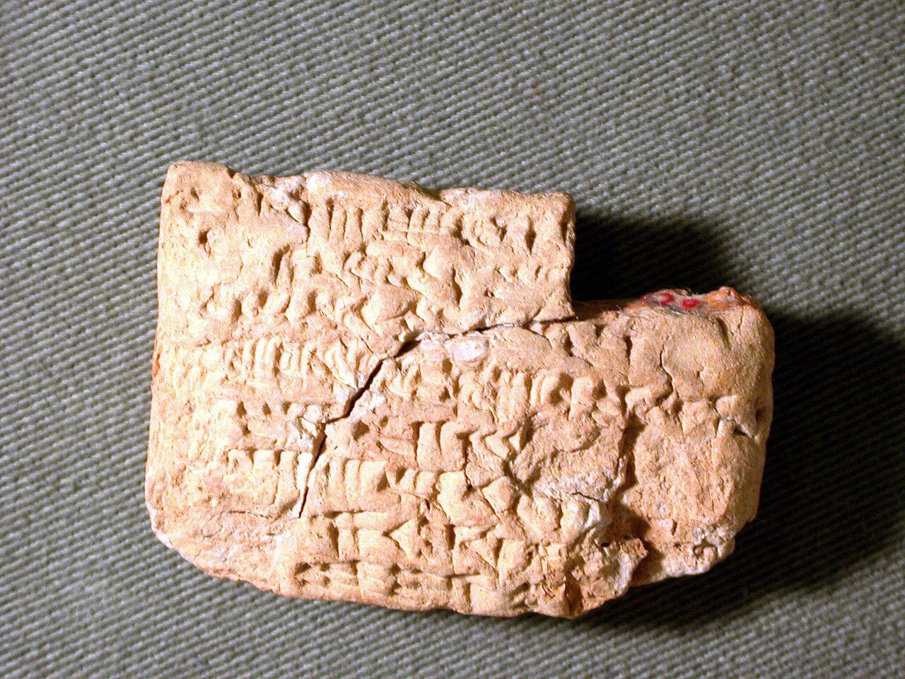 A cuneiform tablet recording a temple silver payment.